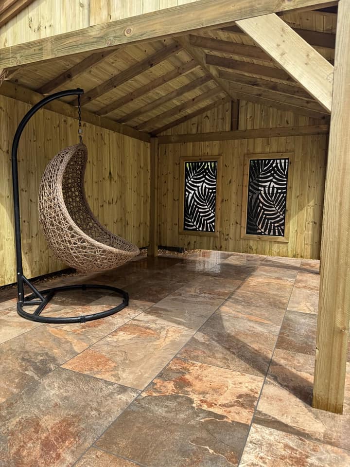 Inside the Kensington gazebo, looking up at the gabled timber roof and decorative privacy panels